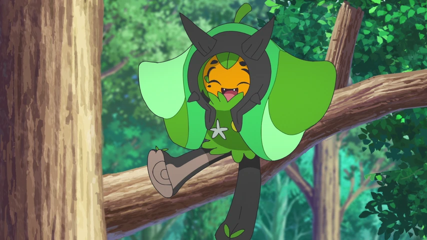 Um Pokémon verde mascarado está agachado sobre um galho, diante das árvores.
